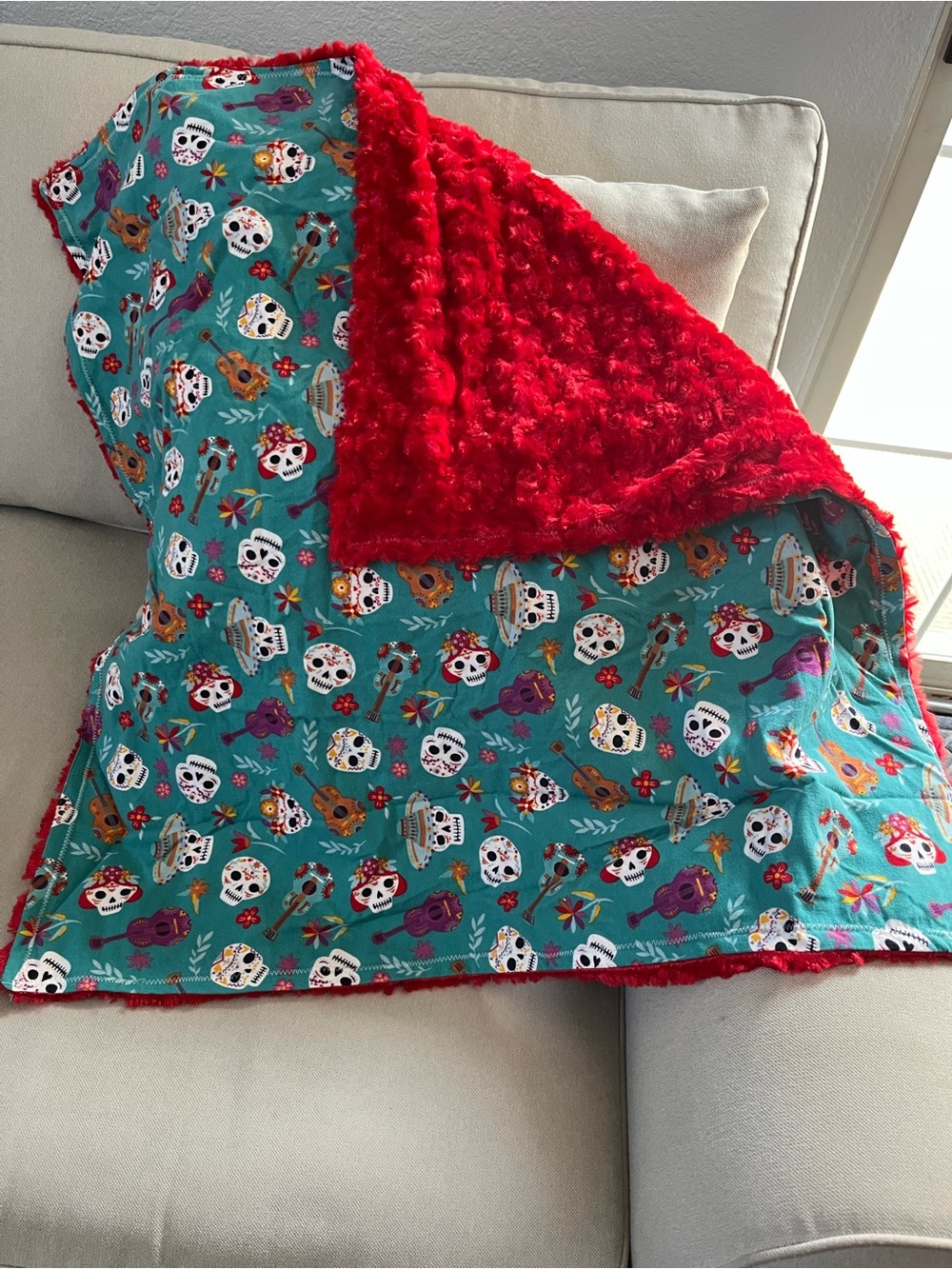 Homemade lap or baby blanket soft red rose minky & cotton flannel sugar skulls.